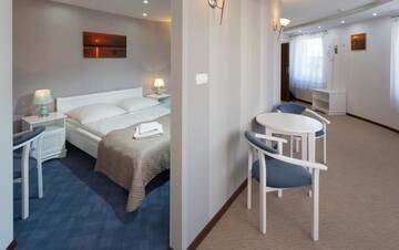 Фото номера Апартаменты Отель Kompleks Hotelowy Logos г. Августов 8