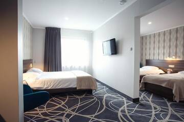 Фото номера Четырехместный номер Делюкс Отель Hotel Nad Nettą г. Августов 4