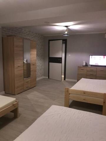 Фото Проживание в семье Sajenek_pl Loft Basment Room г. Августов 1
