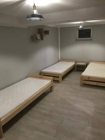 Фото номера Четырехместный номер с общей ванной комнатой Проживание в семье Sajenek_pl Loft Basment Room г. Августов 10