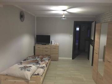 Фото Проживание в семье Sajenek_pl Loft Basment Room г. Августов 2
